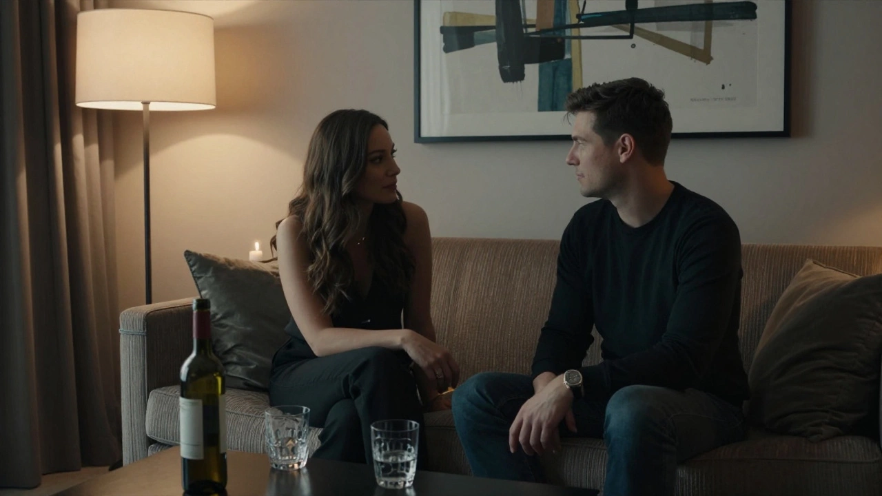 A woman listens intently to a man in a luxury hotel suite, quiet and present, no physical contact.